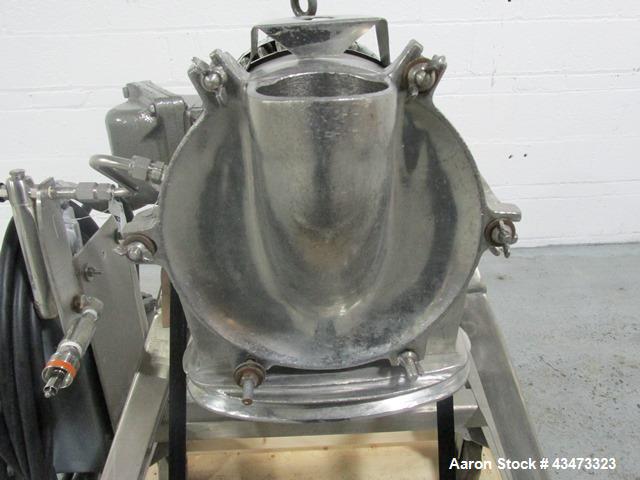 Used Fitzpatrick Homoloid Mill, Model J. Stainless steel product contact surfaces, fixed knives, gravity feed, on stand with direct coupled 3hp, 230/460 volt XP motor. Serial# J-1034.