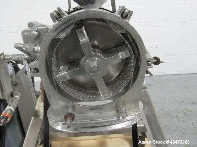 Used Fitzpatrick Homoloid Mill, Model J. Stainless steel product contact surfaces, fixed knives, gravity feed, on stand with direct coupled 3hp, 230/460 volt XP motor. Serial# J-1034.