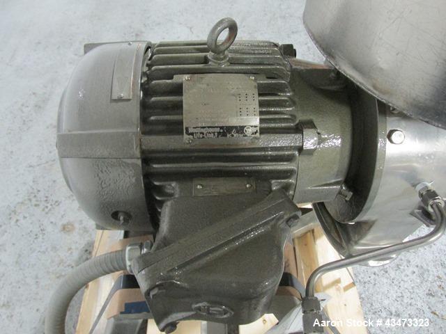 Used Fitzpatrick Homoloid Mill, Model J. Stainless steel product contact surfaces, fixed knives, gravity feed, on stand with direct coupled 3hp, 230/460 volt XP motor. Serial# J-1034.
