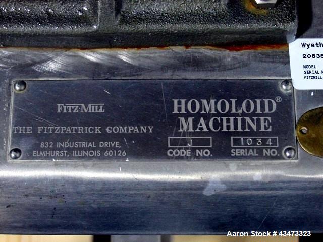 Used Fitzpatrick Homoloid Mill, Model J. Stainless steel product contact surfaces, fixed knives, gravity feed, on stand with direct coupled 3hp, 230/460 volt XP motor. Serial# J-1034.