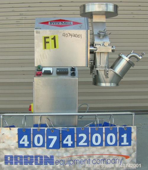 Used Fitzpatrick Fitzmill, model M5A, 316 stainless steel. (16) impact/knife blades. 4 1/2" x 8 3/4" cutting chamber. Gravity feed throat with pan. Driven by a 3 hp, 3/60/230/460 volt, 1760 rpm motor...
