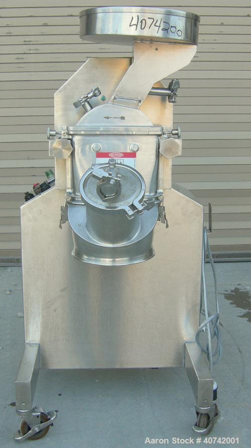 Used Fitzpatrick Fitzmill, model M5A, 316 stainless steel. (16) impact/knife blades. 4 1/2" x 8 3/4" cutting chamber. Gravity feed throat with pan. Driven by a 3 hp, 3/60/230/460 volt, 1760 rpm motor...