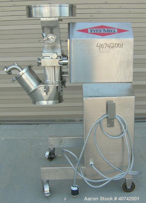 Used Fitzpatrick Fitzmill, model M5A, 316 stainless steel. (16) impact/knife blades. 4 1/2" x 8 3/4" cutting chamber. Gravity feed throat with pan. Driven by a 3 hp, 3/60/230/460 volt, 1760 rpm motor...