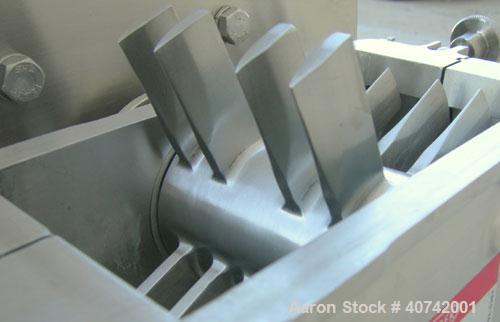 Used Fitzpatrick Fitzmill, model M5A, 316 stainless steel. (16) impact/knife blades. 4 1/2" x 8 3/4" cutting chamber. Gravity feed throat with pan. Driven by a 3 hp, 3/60/230/460 volt, 1760 rpm motor...