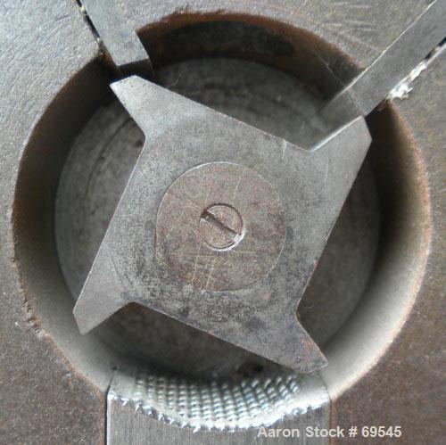 Used Thomas Wiley Cutting Mill, Carbon Steel. Approximately 1 11/16" diameter x 1 1/4" deep cutting chamber with an approximate 1 1/4" diameter, 4 blade rotor and 2 stationary bed knives. No front co...