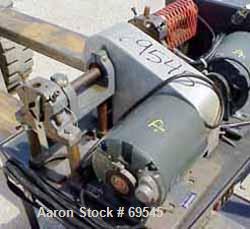 Used Thomas Wiley Cutting Mill, Carbon Steel. Approximately 1 11/16" diameter x 1 1/4" deep cutting chamber with an approximate 1 1/4" diameter, 4 blade rotor and 2 stationary bed knives. No front co...