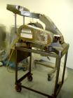 Used Fitzpatrick Fitzmill, Model D6, stainless steel construction, swinging hammers, reversible chamber, pan feed, approximate 5 hp motor, belt driven on base.