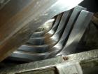Used Fitzmill, Model D6, stainless steel construction, swinging hammers, reversible chamber, pan feed with 5 hp motor on stands.