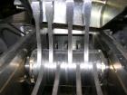 Used Fitzpatrick Fitzmill, Model DASO6, stainless steel. (16) double impact fixed blades, driven by an approximatetly 7.5hp XP motor, 4