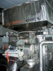 Used Fitzpatrick Fitzmill, Model DASO6, stainless steel. (16) double impact fixed blades, driven by an approximatetly 7.5hp XP motor, 4