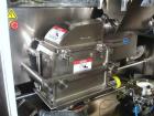 Unused- Fitzpatrick Fitzmill, Model D6A, 316 Stainless Steel. 25RA Mirror polish internal, screw feed with hopper, driven by .5 hp variable speed drive, 5 hp variable speed main drive. Unit is mounte...