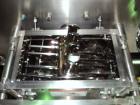 Unused- Fitzpatrick Fitzmill, Model D6A, 316 Stainless Steel. 25RA Mirror polish internal, screw feed with hopper, driven by .5 hp variable speed drive, 5 hp variable speed main drive. Unit is mounte...