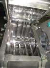 Used Fitzpatick Sanitary Fitzmill, Model D6A. Polished, fixed knives, pan feed. Driven by a 5hp, 230/460 volt motor with VFD. Serial#10648.