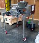 Used Fitzpatrick Fitzmill, Model D6A. Stainless steel construction, cantilivered design with screw feeder with feed hopper, driven by .37 kw, 230/400 volt, 1430 rpm motor, on stainless steel base wit...
