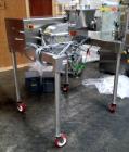 Used Fitzpatrick Fitzmill, Model D6A. Stainless steel construction, cantilivered design with screw feeder with feed hopper, driven by .37 kw, 230/400 volt, 1430 rpm motor, on stainless steel base wit...