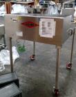 Used Fitzpatrick Fitzmill, Model D6A. Stainless steel construction, cantilivered design with screw feeder with feed hopper, driven by .37 kw, 230/400 volt, 1430 rpm motor, on stainless steel base wit...