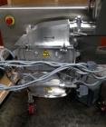 Used Fitzpatrick Fitzmill, Model D6A. Stainless steel construction, cantilivered design with screw feeder with feed hopper, driven by .37 kw, 230/400 volt, 1430 rpm motor, on stainless steel base wit...