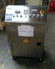 Used Fitzpatrick Fitzmill, Model D6A. Stainless steel construction, cantilivered design with screw feeder with feed hopper, driven by .37 kw, 230/400 volt, 1430 rpm motor, on stainless steel base wit...