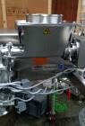 Used Fitzpatrick Fitzmill, Model D6A. Stainless steel construction, cantilivered design with screw feeder with feed hopper, driven by .37 kw, 230/400 volt, 1430 rpm motor, on stainless steel base wit...