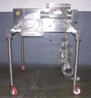 USED: D6A Fitzmill, stainless steel construction. Fixed knives, cantilevered design, screw feed with approximate 1/4 hp XP motor with hopper, 7.5 hp 230/460 volt XP main drive, with product containme...