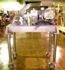 Used Fitzpatrick Fitzmill, Model D6, Stainless Steel. (16) Knife/impact swinging blades, reversible chamber, pan feed with 5 hp 220/440 volt motor on stands.
