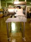 Used Fitzpatrick Fitzmill, Model D6, Stainless Steel. (16) Knife/impact swinging blades, reversible chamber, pan feed with 5 hp 220/440 volt motor on stands.