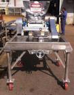 Used Fitzpatrick Fitzmill, Model DAS012, Stainless Steel.  Drop feed, 20 hp motor, mounted on stainless steel base.