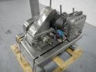 Used Fitzpatrick Fitzmill, Model DASO6, Stainless Steel. Knife/impact fixed blades. Mounted on a base and pedestal with a 7.5hp, 230/460 volt, 1750 rpm XP motor. Gravity feed throat, missing feed pan...