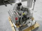 Used Fitzpatrick Fitzmill, Model DASO6, Stainless Steel. Knife/impact fixed blades. Mounted on a base and pedestal with a 7.5hp, 230/460 volt, 1750 rpm XP motor. Gravity feed throat, missing feed pan...