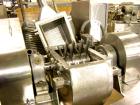 Used Fitzpatrick Fitzmill, Model DASO6, Stainless Steel. Fixed knives, air swept feed, 7.5 hp, 230/460 volt main drive. Mounted on legs with casters.