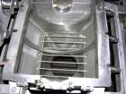Used Fitzpatrick Fitzmill, Model DKASO-12, Stainless Steel. Twin screw feed wtih 1 hp, 230/460 volt XP drive, less rotor, cover, bearings, guard, ends and seals. Approximately 20 hp main drive.