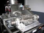USED: Fitzmill model DKASO-12, stainless steel construction. Fixed knives, twin screw feed with 1 hp, 230/460 volt XP drive, 10/15 hp, 190/380/230/460 XP main drive. Missing feed throat. Mounted on l...