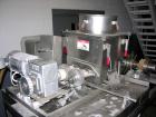 USED: Fitzmill model DKASO-12, stainless steel construction. Fixed knives, twin screw feed with 1 hp, 230/460 volt XP drive, 10/15 hp, 190/380/230/460 XP main drive. Missing feed throat. Mounted on l...