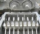 Used Fitzpatrick Fitzmill, Model DKASO12, 316 stainless steel. (32) impact/knife fixed 410 stainless steel blades, 11