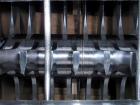 Used Fitzpatrick Fitzmill, Model DKASO12, stainless steel construction, (32) knife/impact fixed knives, reversible chamber, gravity feed, 15 hp motor, belt driven. Mounted on a stainless steel base, ...