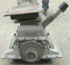 Used Fitzpatrick Fitzmill, model FASO20, 304 stainless steel. (48) stainless steel fixed double knife blades. 20