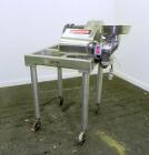 Used Fitzpatrick Homoloid Mill, Model JT, 316 Stainless Steel. 7-1/2'' Diameter x 2'' deep chamber, (12) 410/16/20 stainless steel swinging impact/knife blades. Bottom screen. Top 304 stainless steel...
