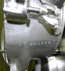 Used Fitzpatrick Homoloid Mill, Model JT, 316 Stainless Steel. 7-1/2'' Diameter x 2'' deep chamber, (12) 410/16/20 stainless steel swinging impact/knife blades. Bottom screen. Top 304 stainless steel...