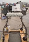 Used Fitzpatrick Homoloid Mill, Model JT, 304 stainless steel. 8'' diameter x 2'' deep chamber, (12) 410 stainless steel swinging double impact blades, bottom screen. Top feed, no pan. Driven by a 5 ...