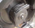 Used Fitzpatrick Homoloid Mill, Model JT, 316 stainless steel. 8'' diameter x 2'' deep chamber, (12) 410 stainless steel swinging impact/knife blades, no bottom screen. Top feed with pan. Driven by a...
