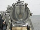 Used Fitzpatrick Homoloid Mill, Model J. Stainless steel product contact surfaces, fixed knives, gravity feed, on stand with direct coupled 3hp, 230/460 volt XP motor. Serial# J-1034.