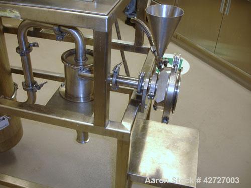 Used Hosokawa Alpine Spiral Jet Mill, Model 100 AS, 316 Stainless Steel. (1) Ktron volumetric feeder with lump breaker, model K2MVS60, feeder hopper, cyclone fines collector, single bag dust collecto...