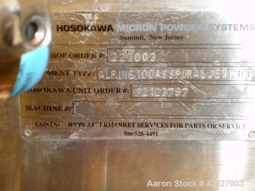 Used Hosokawa Alpine Spiral Jet Mill, Model 100 AS, 316 Stainless Steel. (1) Ktron volumetric feeder with lump breaker, model K2MVS60, feeder hopper, cyclone fines collector, single bag dust collecto...