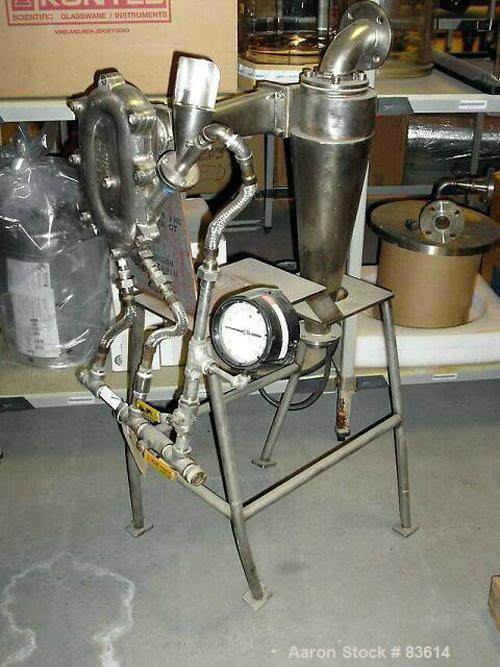 USED: Fluid Energy Jet Mizer, model 0202-C65, stainless steel. Vertically oriented jet mill with tangential grinding nozzles. Rated capacity from 1-100 pounds an hour. Requires 50-120 cfm air supply....