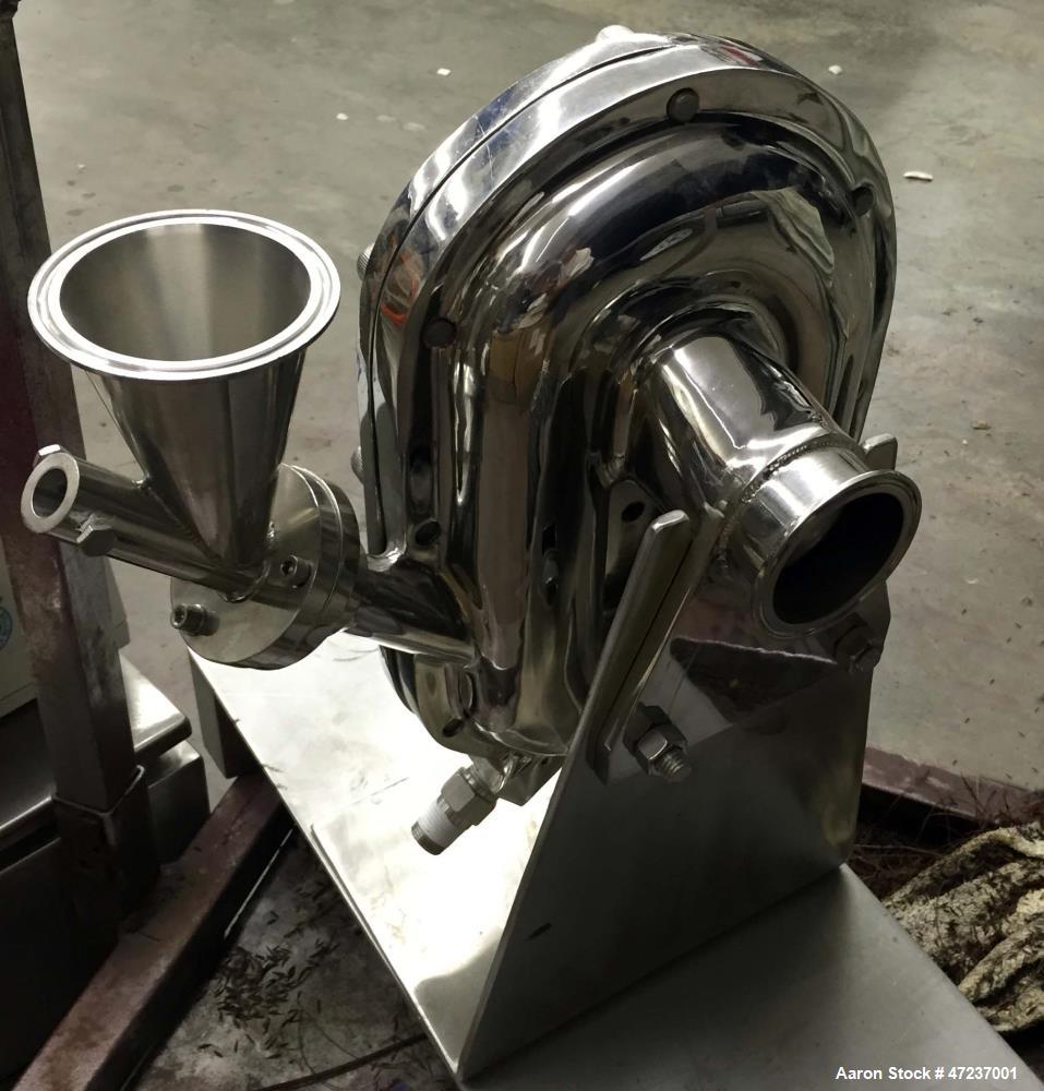 Used Fluid Energy Jet-O-Mizer Mill, Aljet Model 0202. 316L stainless steel, feed hopper, adjustable pusher nozzle, removable venturi nozzle, manifold, grinding chamber, mill stand, quick disconnect f...