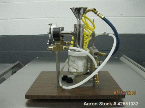 Used Glen Mills 2'' Laboratory Jet Mill, Stainless Steel. Bench top design, size reduction 10 microns and below with cyclone and collection jar.