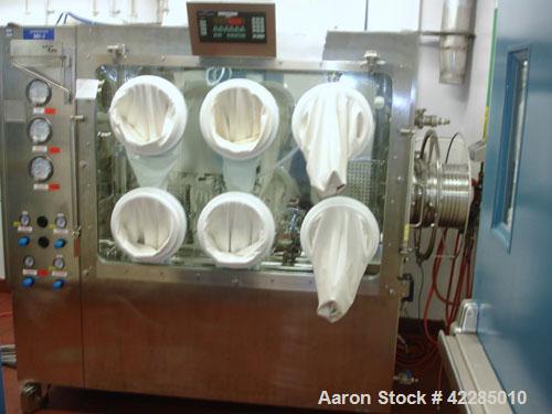 Used Jetpharma Jet Mill, Model MCJETMILL 50, Stainless Steel. Approximately 4’’ diameter. Rated .05-5 kg/hr, batch size 3g-20kg. Unit includes a Ktron twin screw feeder mounted in Isolation Solutions...
