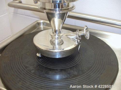 Used Jetpharma Jet Mill, Model MCJETMILL 50, Stainless Steel. Approximately 4’’ diameter. Rated .05-5 kg/hr, batch size 3g-20kg. Unit includes a Ktron twin screw feeder mounted in Isolation Solutions...