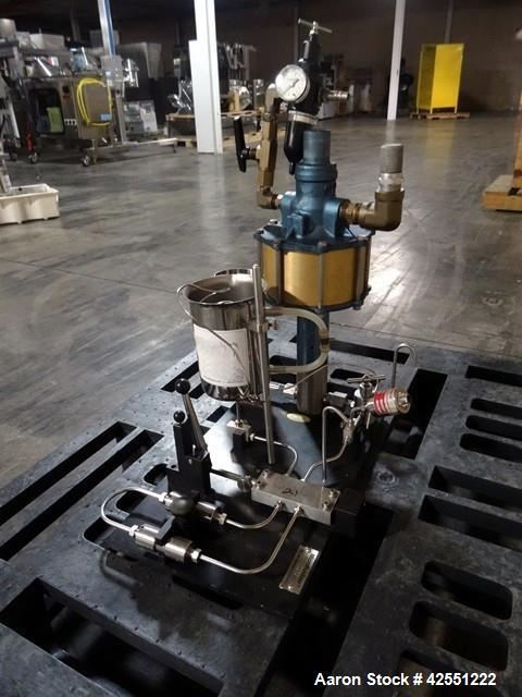 Used Microfluidics Microfluidizer, Model 110F, Stainless Steel. Nominally flow rated 525 ml/minute (water). Rated up to 3000-18000 psi pressure range. Air operated pump with feed hopper and back flus...