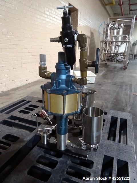 Used Microfluidics Microfluidizer, Model 110F, Stainless Steel. Nominally flow rated 525 ml/minute (water). Rated up to 3000-18000 psi pressure range. Air operated pump with feed hopper and back flus...